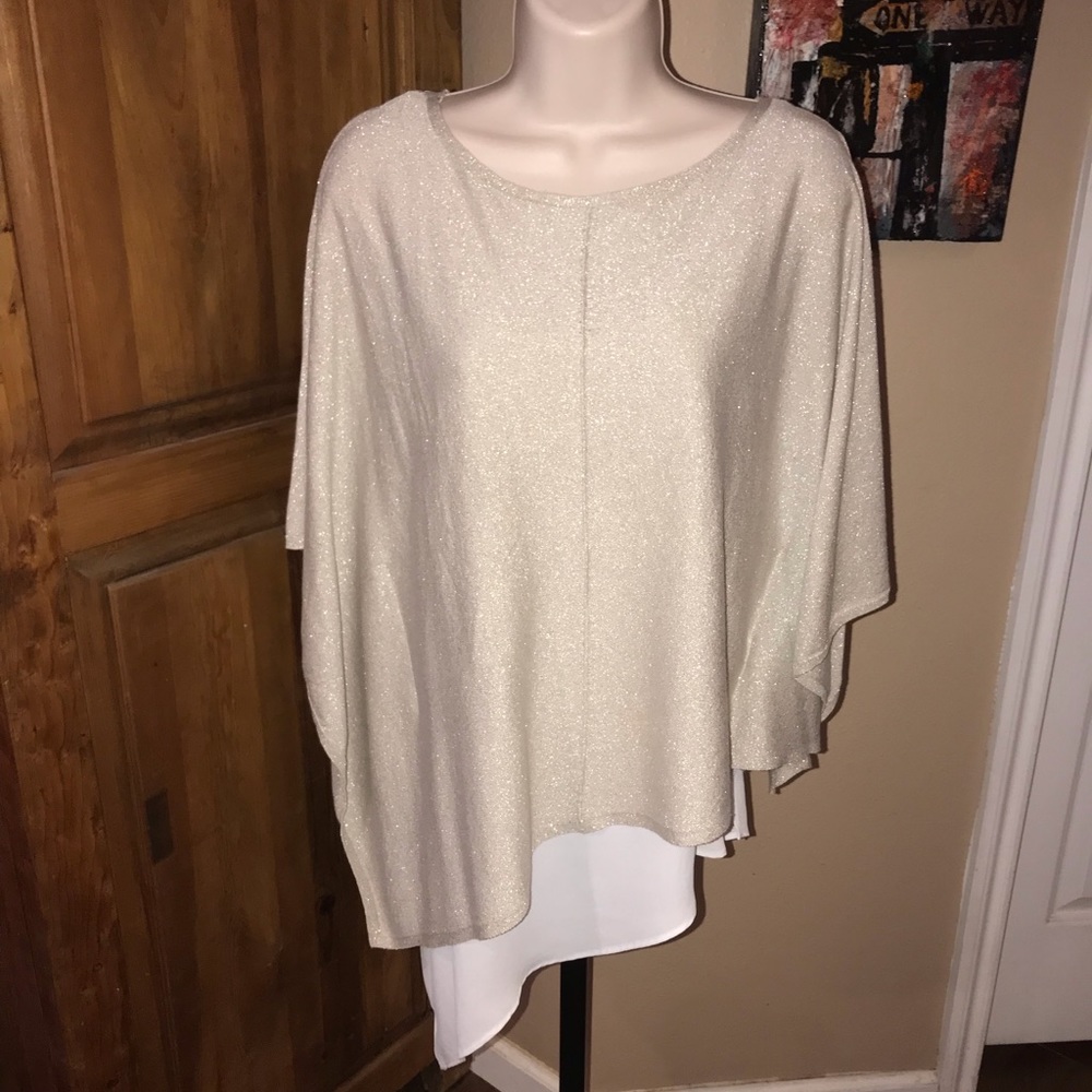 White House black market light gold flowy top with a white tank underneath